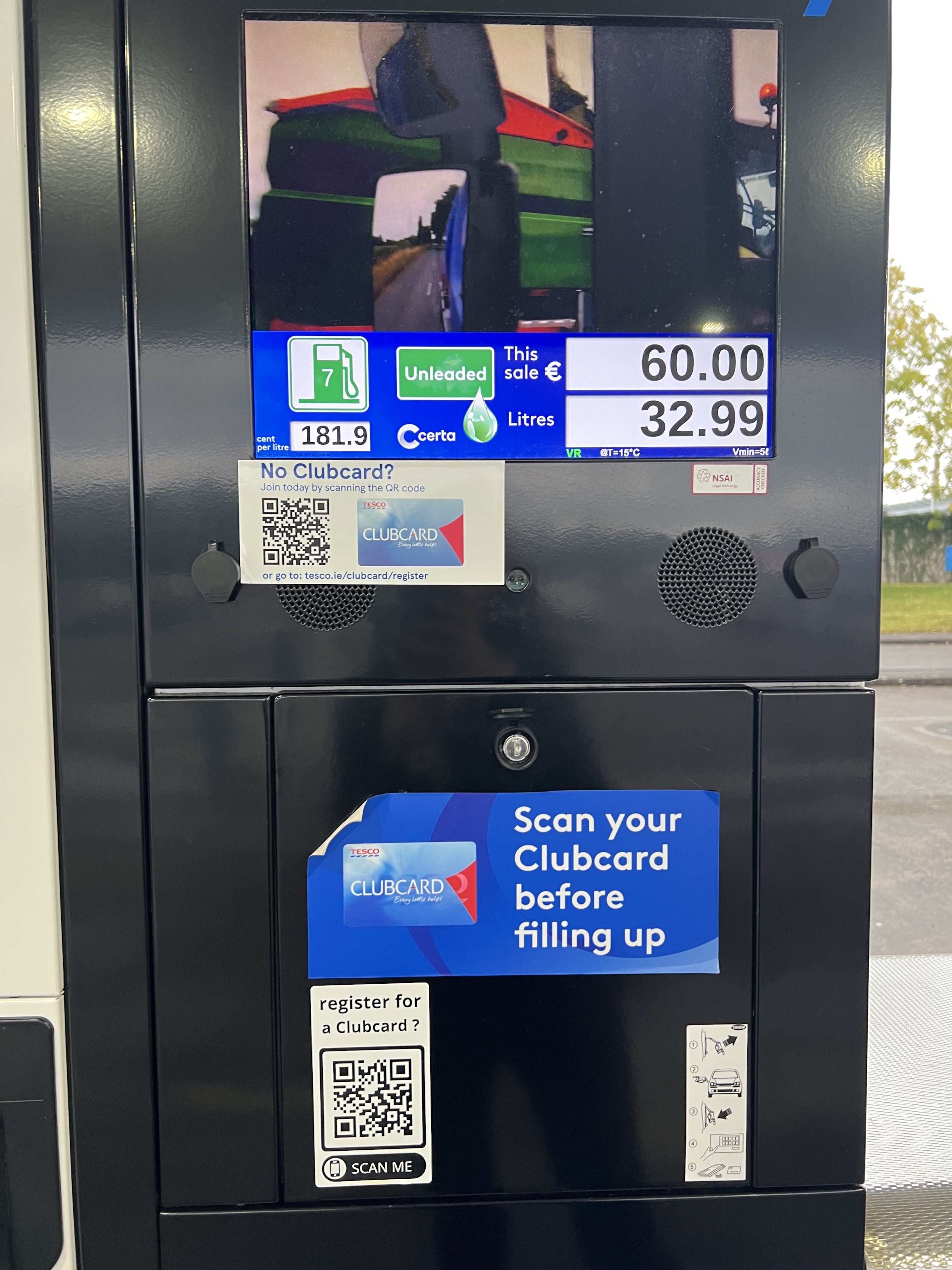 Petrol pump with scanning for rewards card.